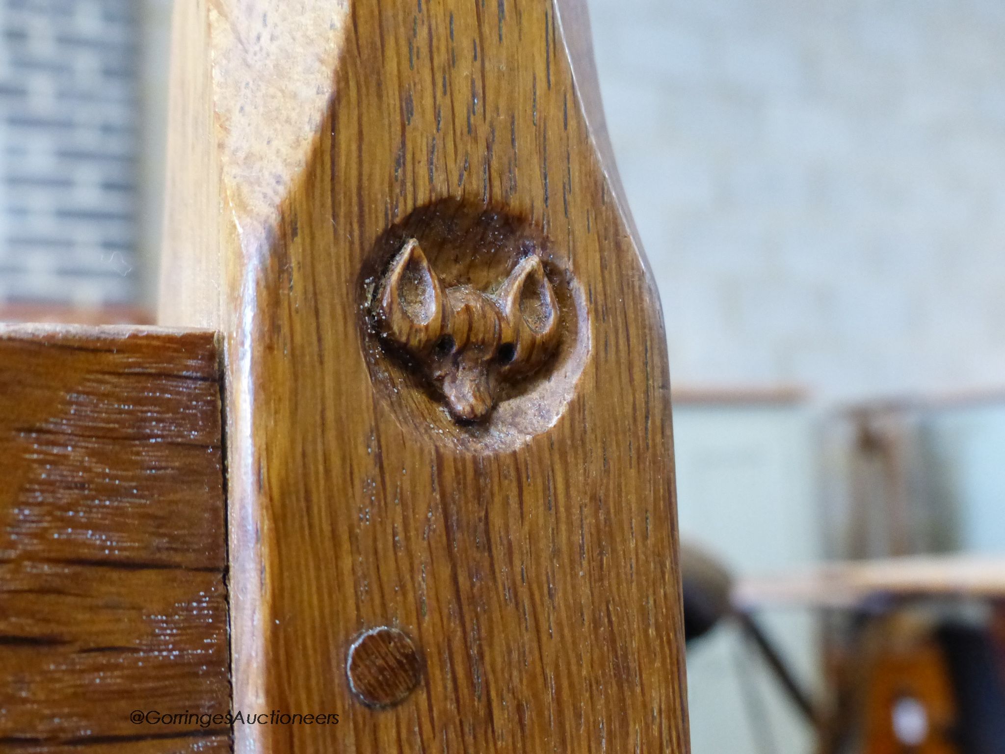 An Arts & Crafts Yorkshire School Malcolm Pipes Foxman oak trolley with original Shepherd castors carved Fox head signature. W-86cm, D-38cm, H-75cm.